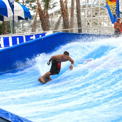 Enjoying Flowrider Water Ride , Surfing Attractive Wave Skid Board / Aqua Park Amusement